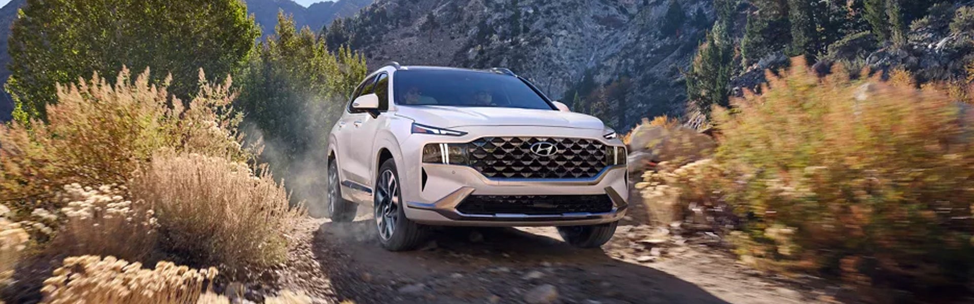 2024 Hyundai Santa Fe Hybrid running offroading in mountain area