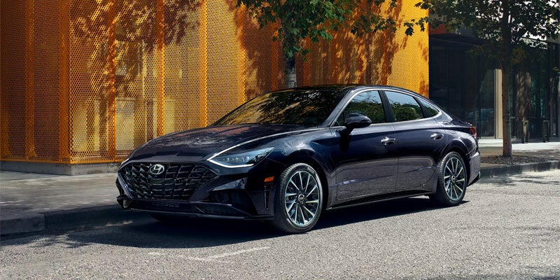 Hyundai Sonata standing outside home