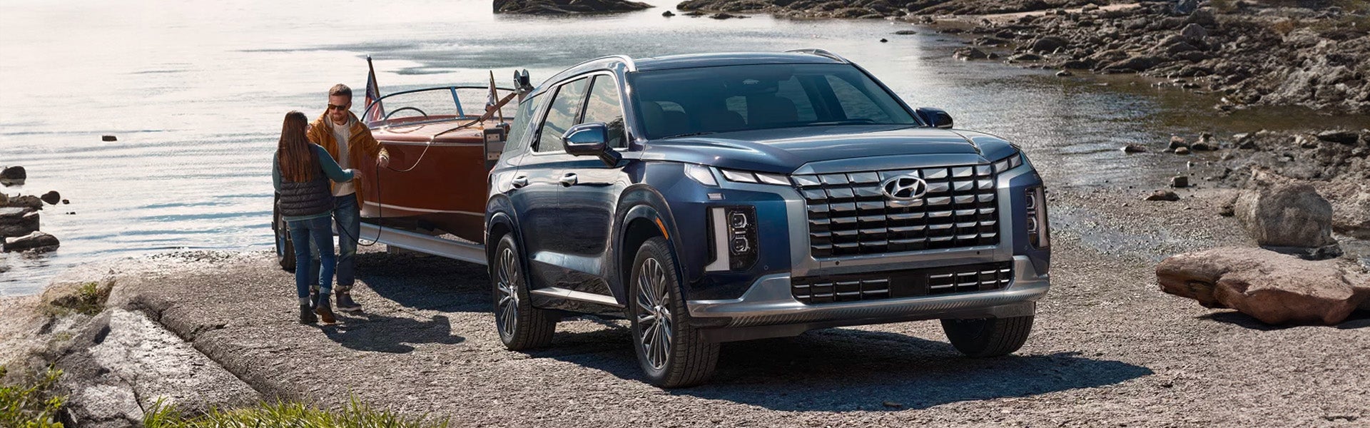 Navy blue 2024 Hyundai Palisade standing near riverside