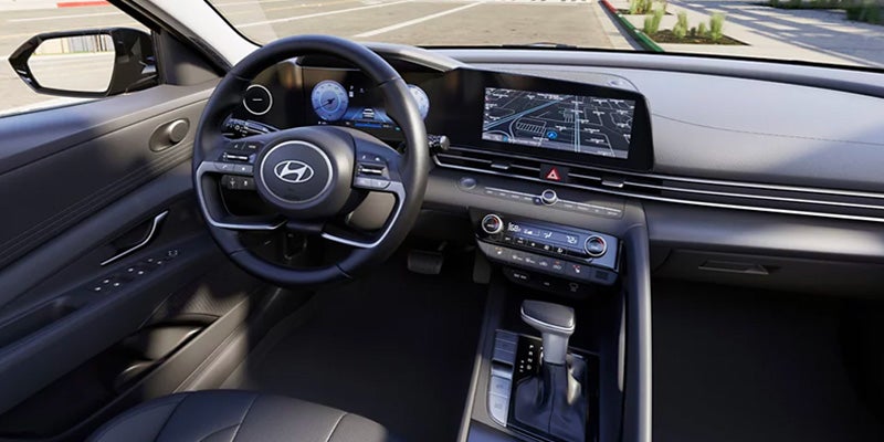 Interior design of a Hyundai Elantra showcasing the steering wheel and center console